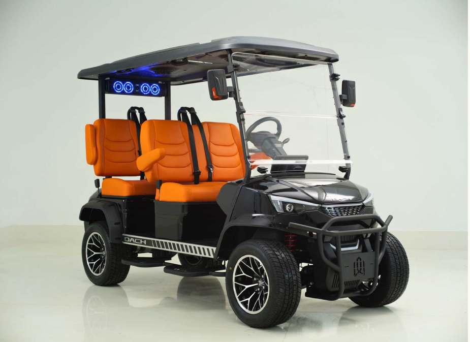 A red golf cart with an American flag on the front is parked in a garage.