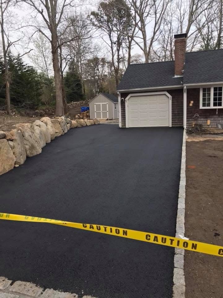 A driveway with a caution tape around it