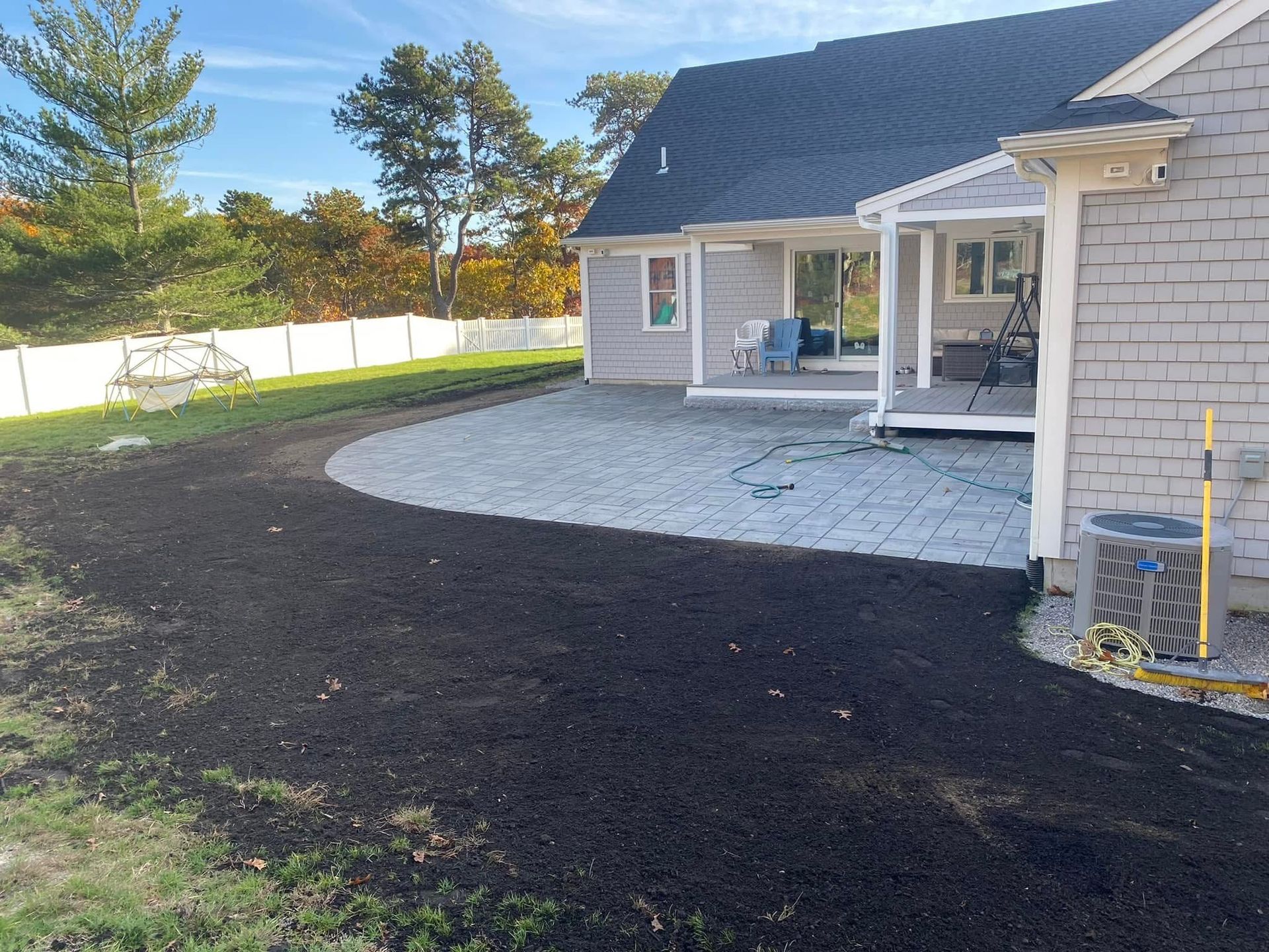 A house with a patio in front of it