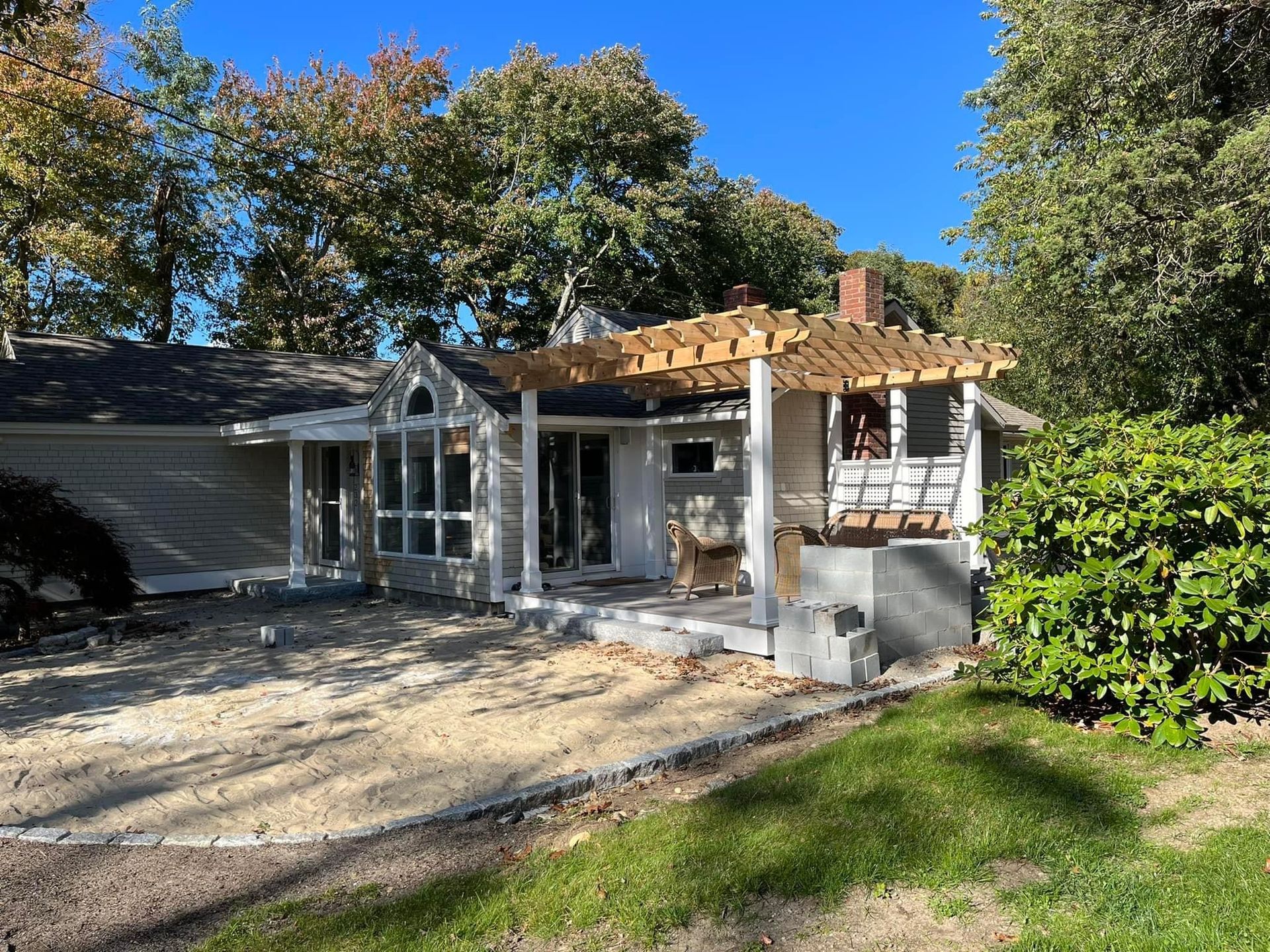 A large white house with a sign in front of it that says park