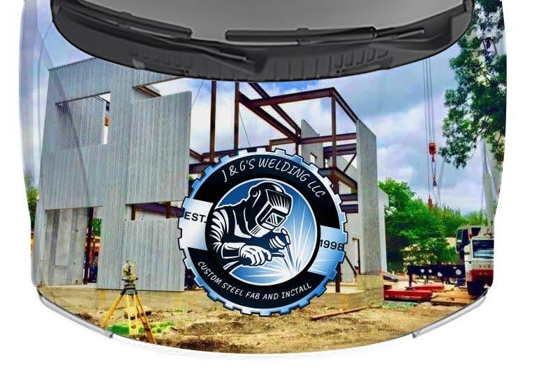 Round logo over a construction site with metal framing, concrete walls, and dirt ground under a cloudy sky.
