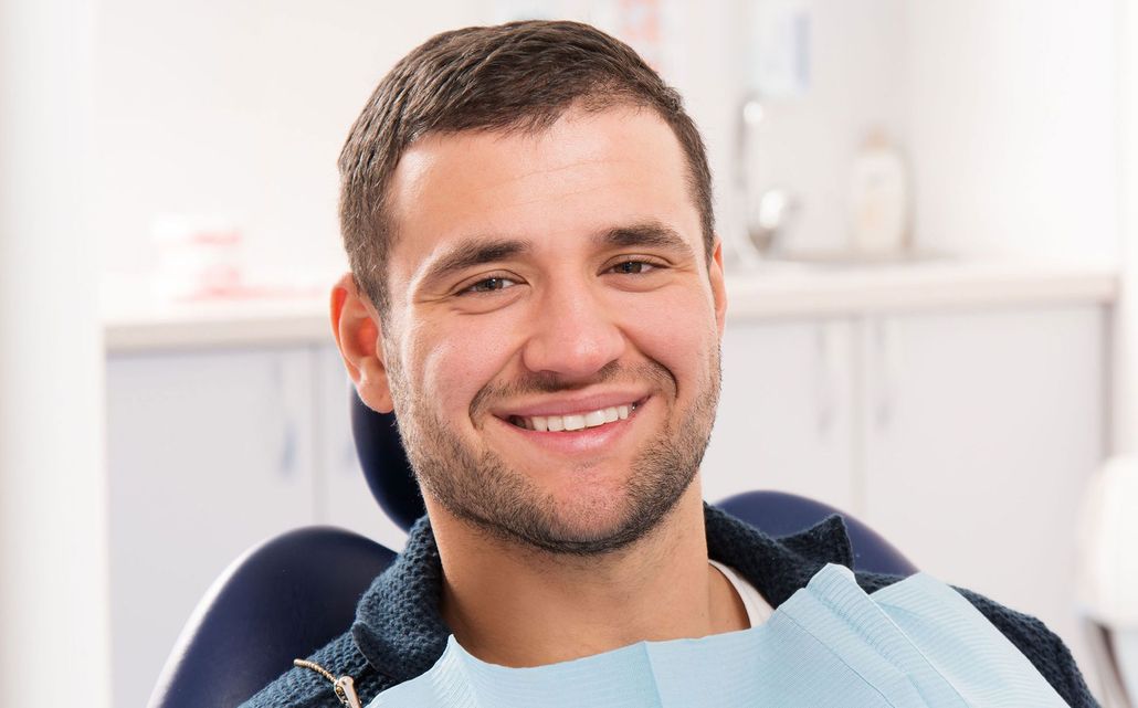 A Dentsply Sirona CEREC dental system including a scanner station, milling unit, and furnace for chairside restorations.