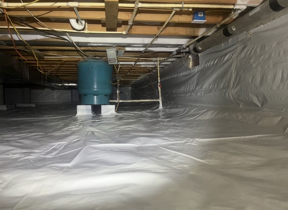 The crawl space is covered in plastic.