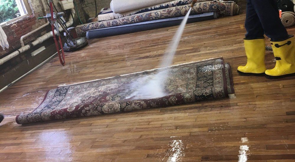 Rug being professionally cleaned