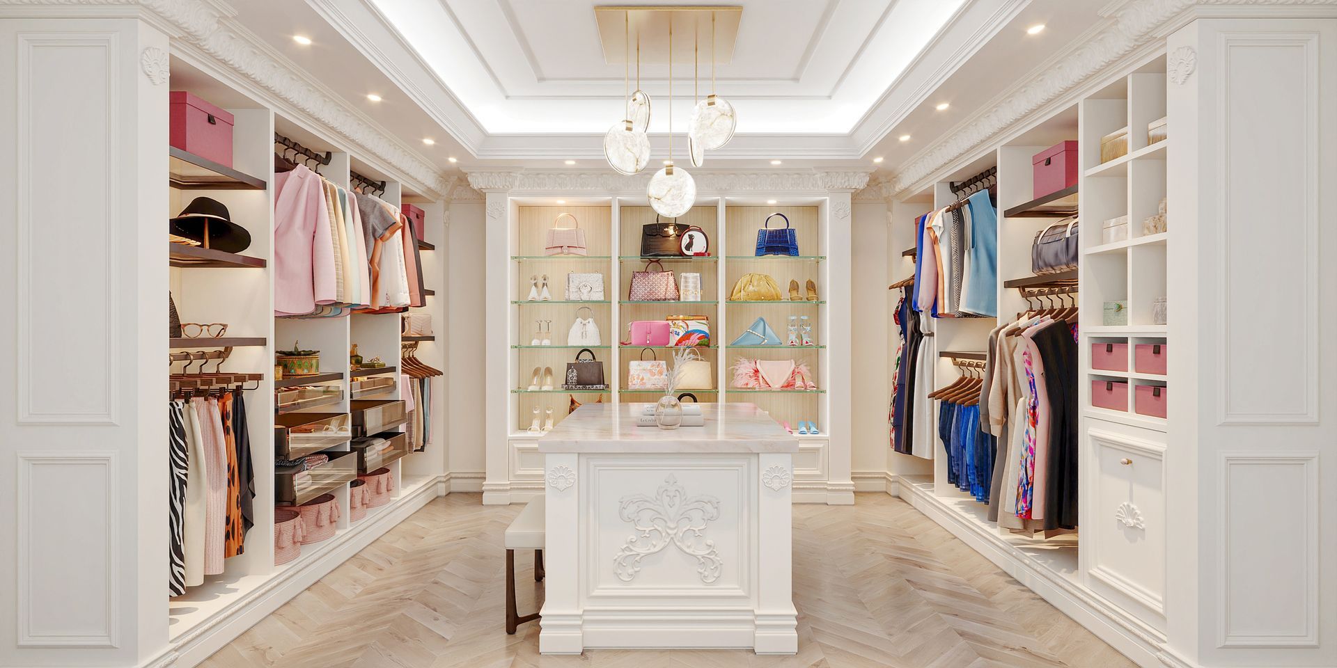 Spacious white walk-in closet with clothing racks, shelves, and a central island displaying handbags.  Pink storage boxes and a chandelier add pops of color.