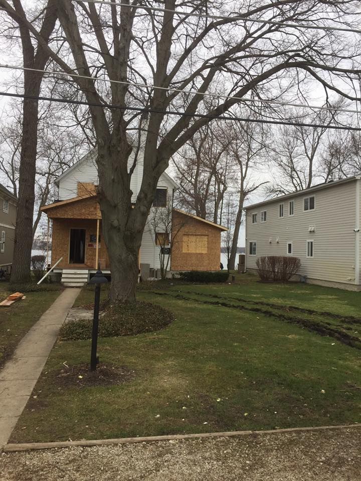 A house with a wooden roof is being remodeled.