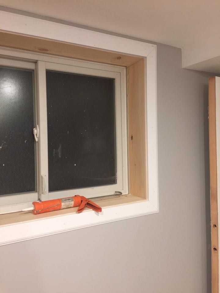 A window in a room with a tool on the window sill.