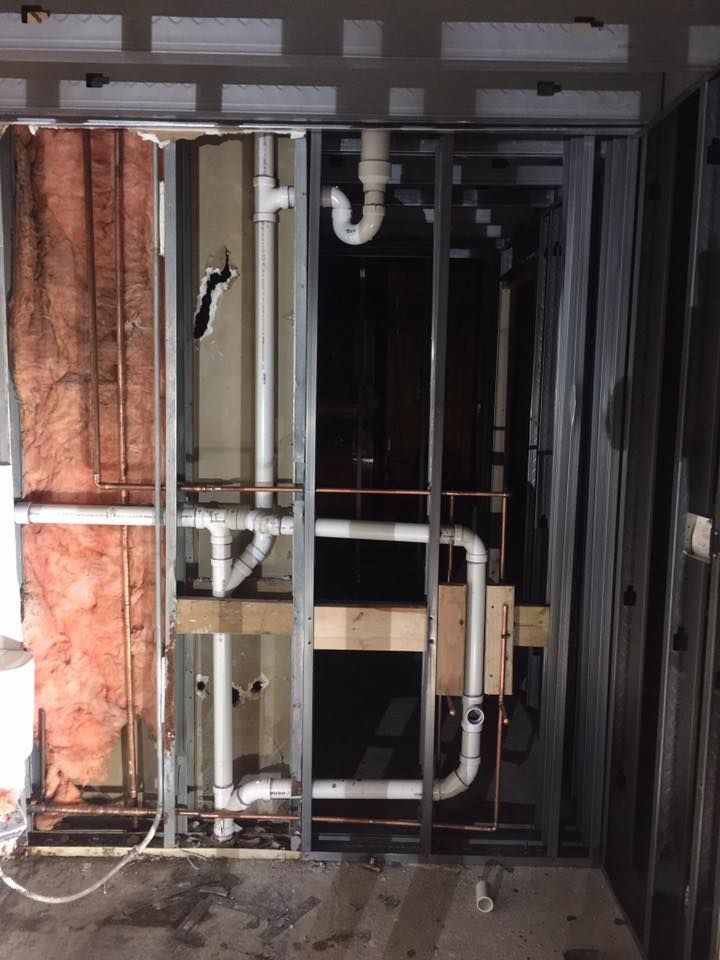 A room with a lot of pipes coming out of it