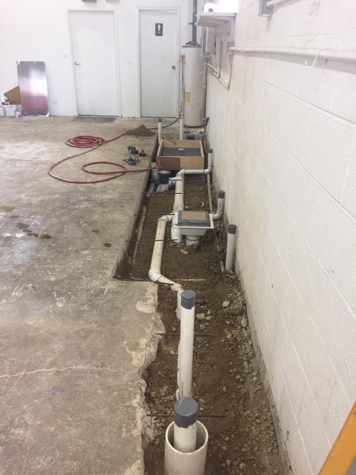 A room with a lot of pipes going through it