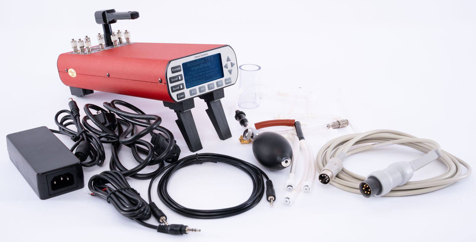Red medical device with cables, probes, and accessories arranged on a white background