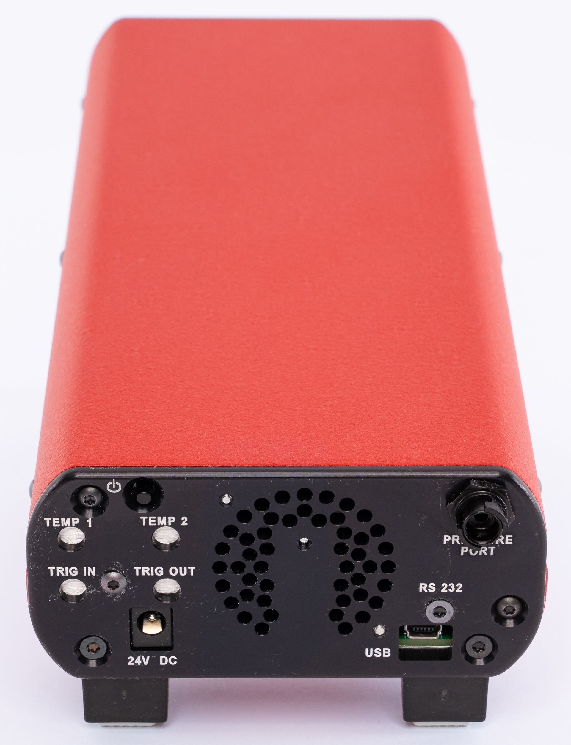 Red electronic device rear panel with ports, vents, and connectors on a white background