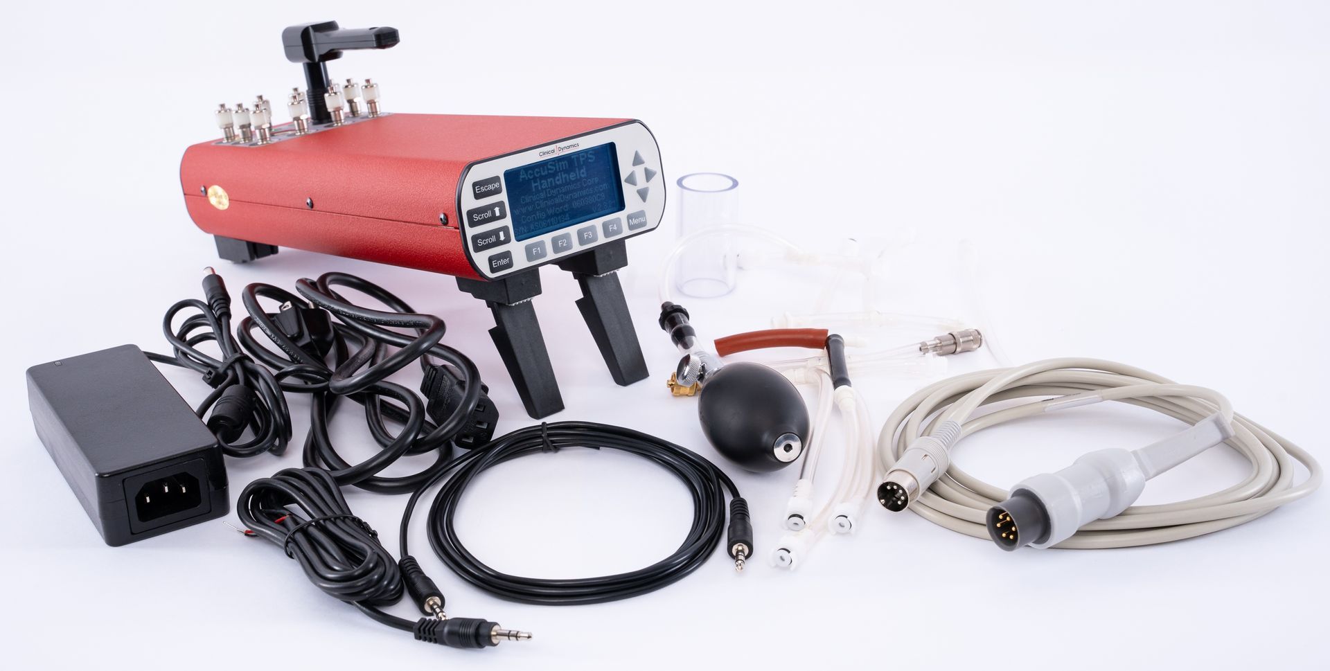 Red handheld device with cables, control box, probes, and accessories laid out on a white background