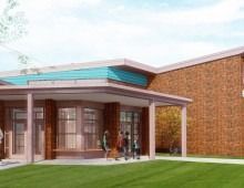 School building exterior, brick and blue accents, students standing at entrance.