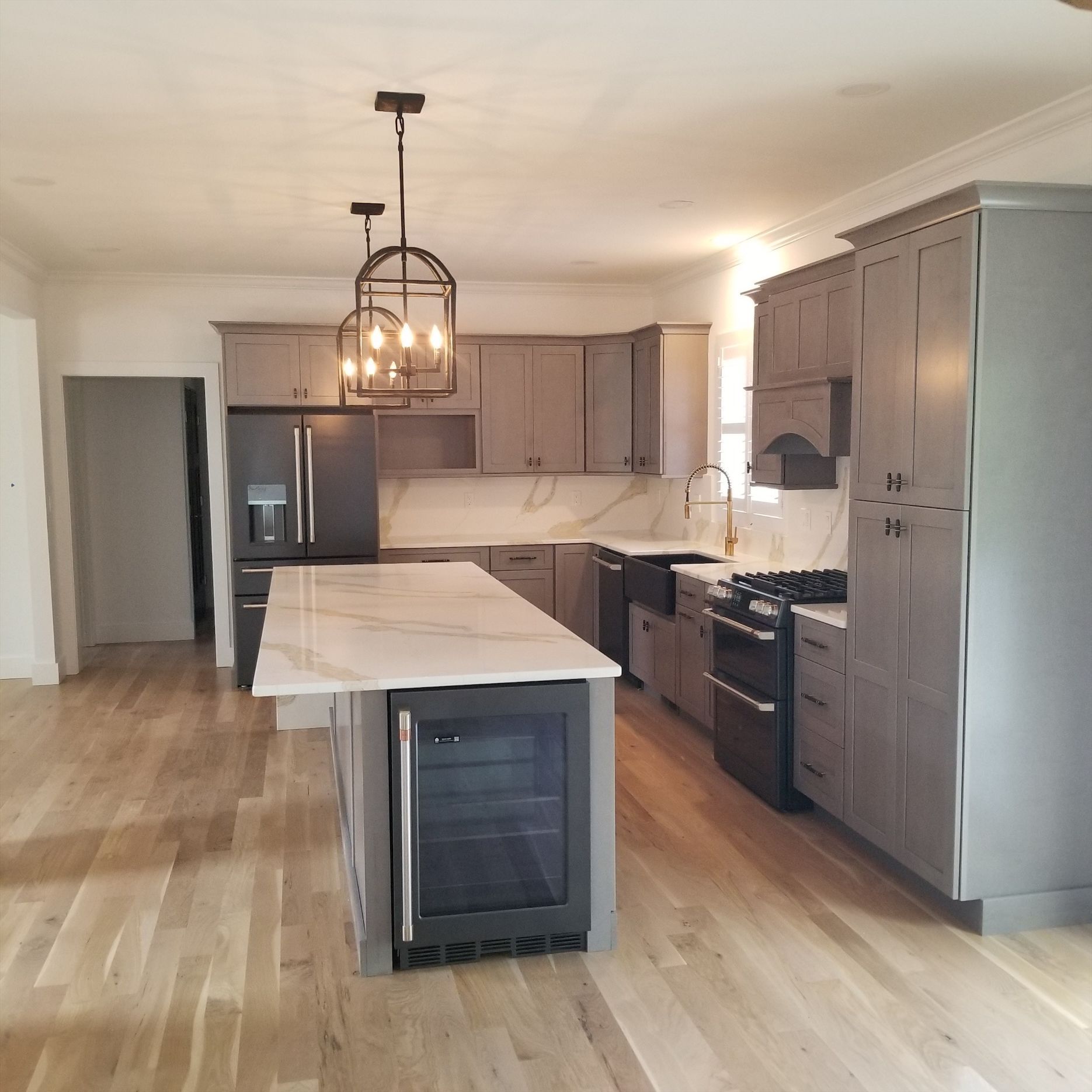 a kitchen with a large island in the middle