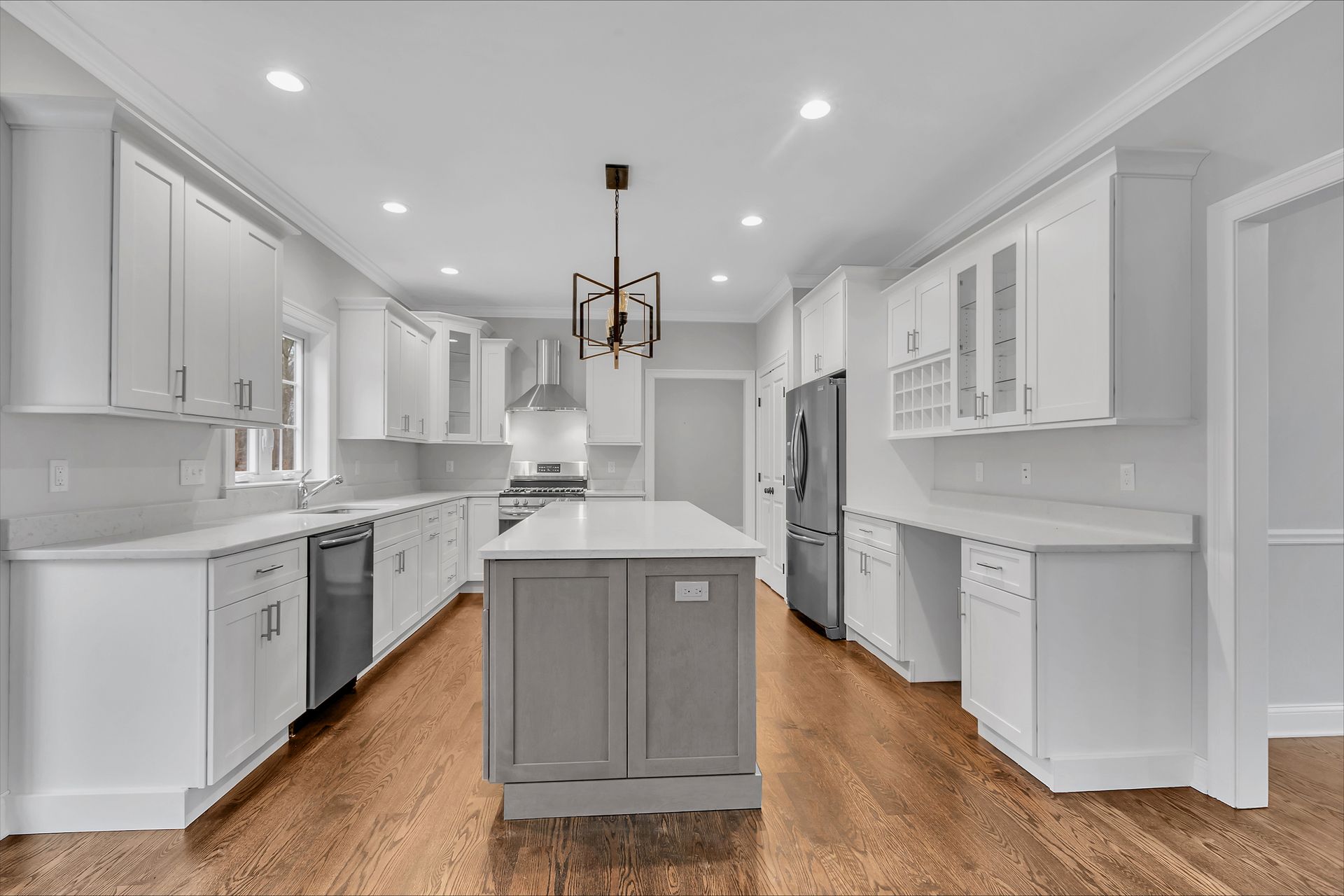 there is a large island in the middle of the kitchen