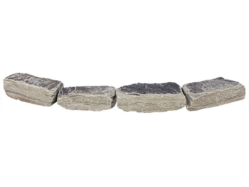 Four textured, rectangular gray landscape stones arranged in a slight curve against a white background.