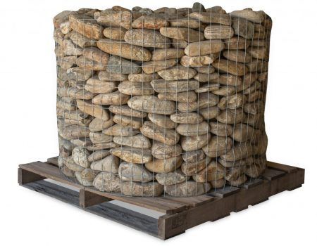 Stacked rocks in wire cages on a wooden pallet