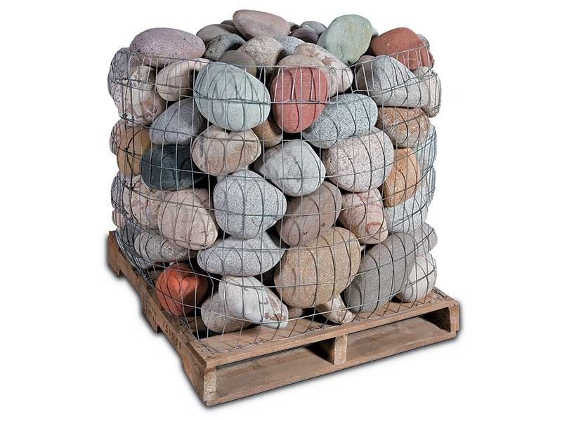 Pallet stacked with colorful stone or concrete balls tied with wire mesh.