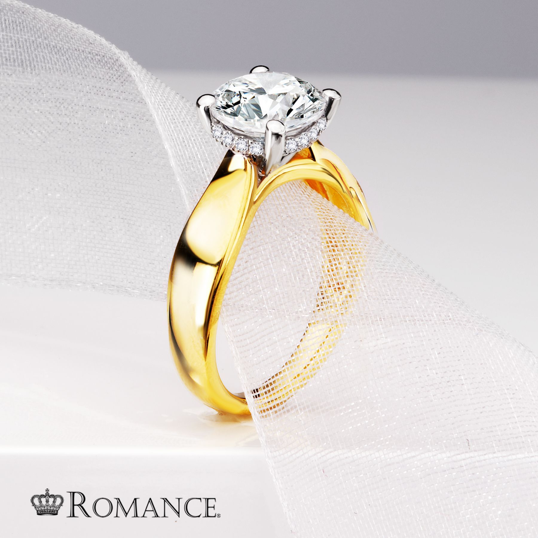 A yellow gold ring with a diamond in the center