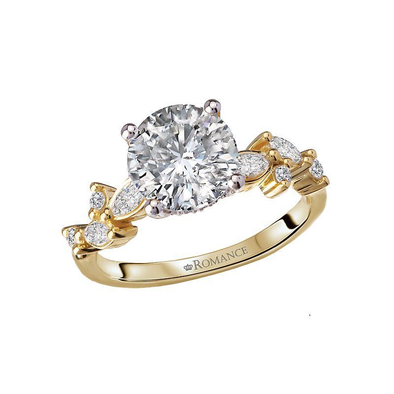 A yellow gold ring with a diamond in the center