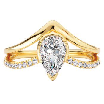 A yellow gold ring with a pear shaped diamond in the center.