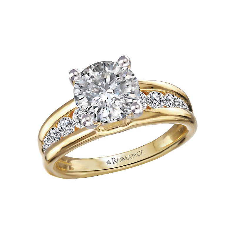 A yellow gold ring with a diamond in the center
