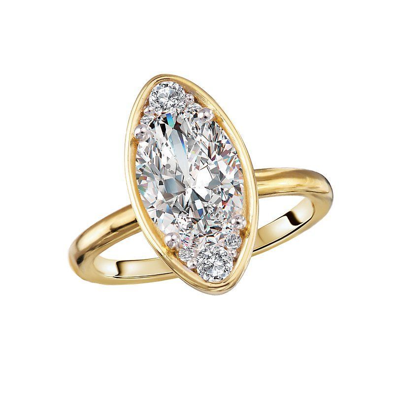 A yellow gold ring with a large diamond in the center surrounded by smaller diamonds.