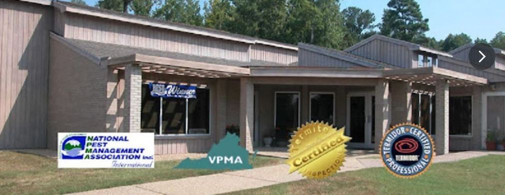 A picture of a building with a vpma logo on it