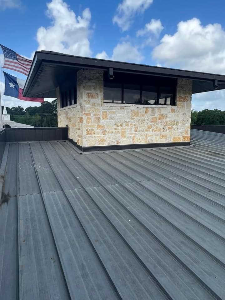 The roof of a building with an american flag on it