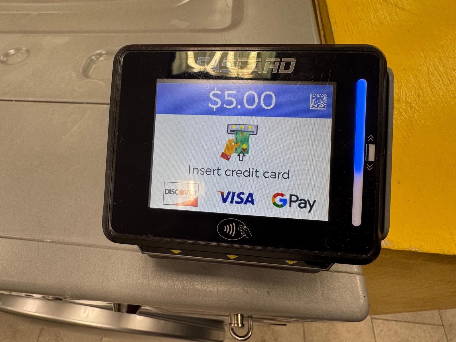 Payment machine with a screen displaying 