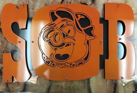 A sign that says sob with a picture of a pig on it