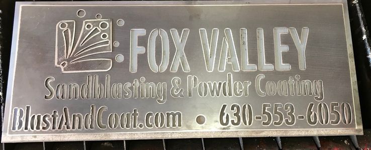 A sign for fox valley sandblasting and powder coating
