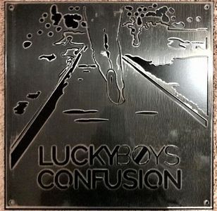 A metal sign that says luckyboys confusion on it