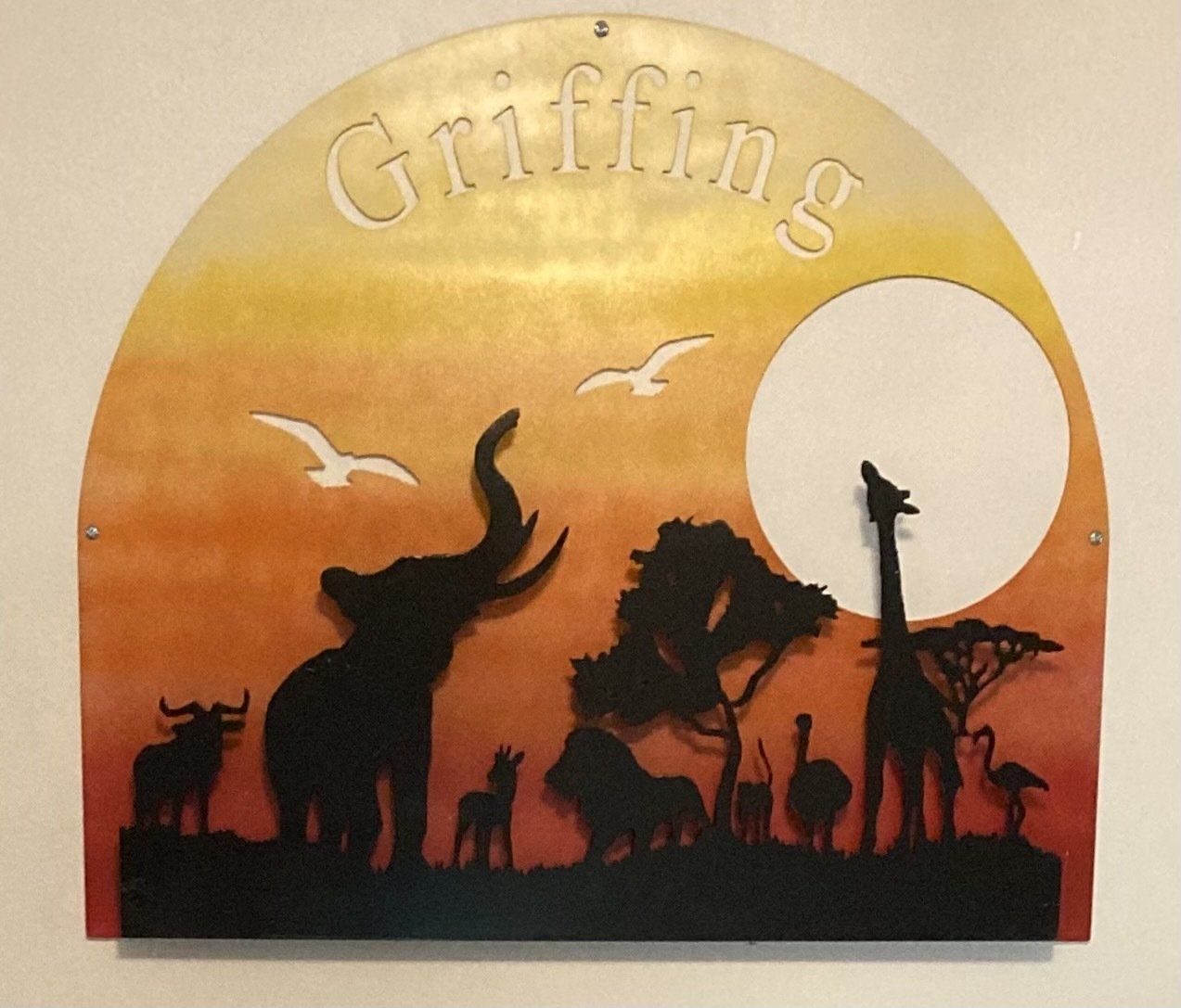 A sign that says griffing with silhouettes of animals