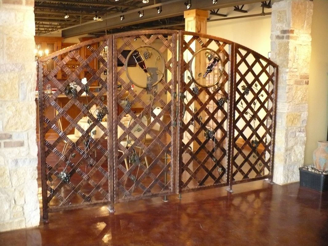 A room with a wooden fence and a brick wall