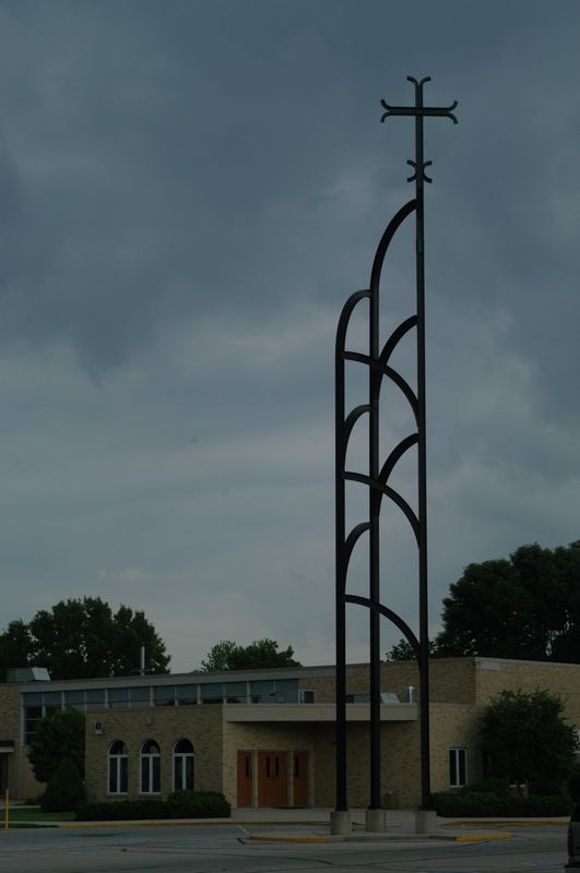 A church with a cross on top of it