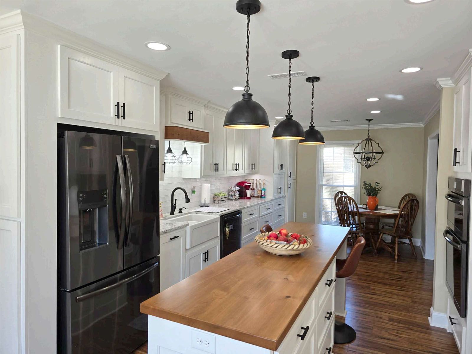 A large island in the middle of a newly remodeled kitchen