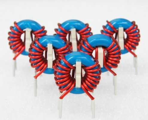 A bunch of blue and red coils on a white surface