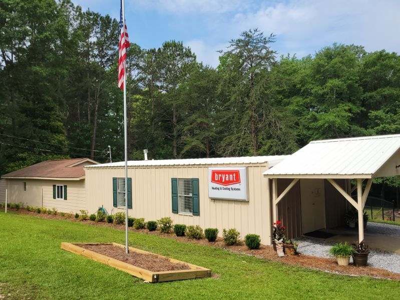 Tan building with sign 