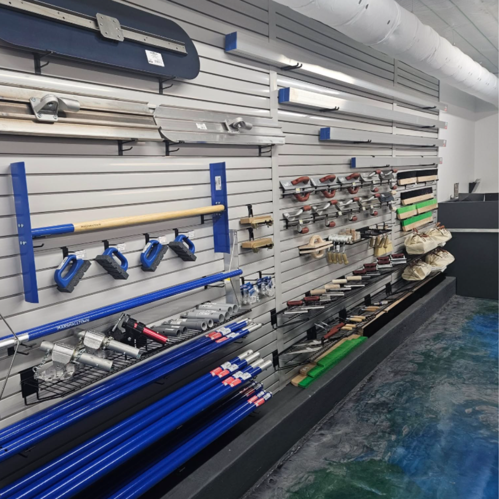 A wall with a bunch of tools hanging on it