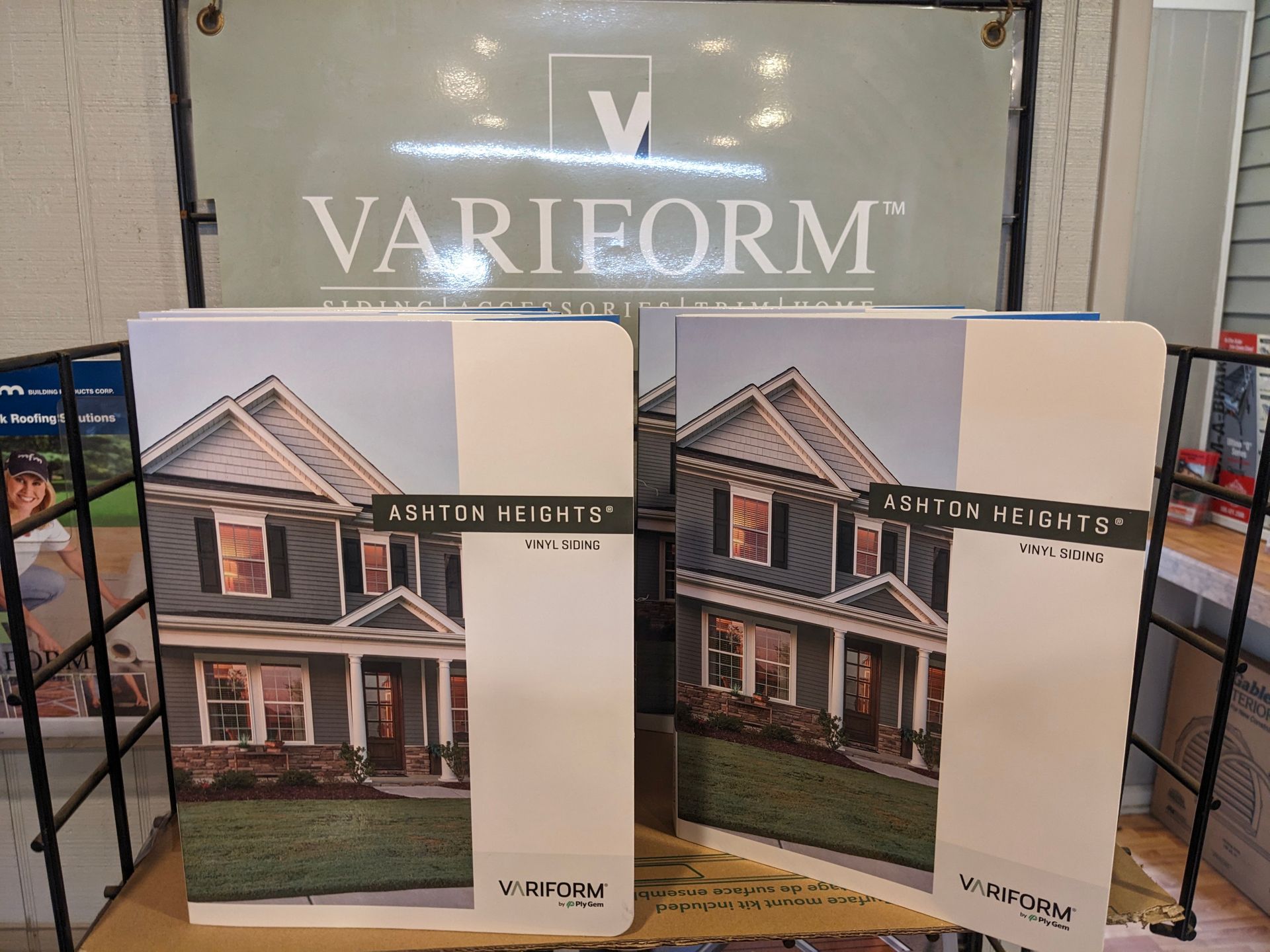 Two brochures displaying a house with