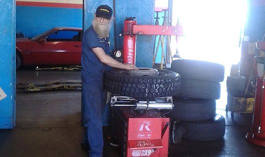Mechanic fixing tire