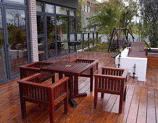 Upscale wooden deck with furniture