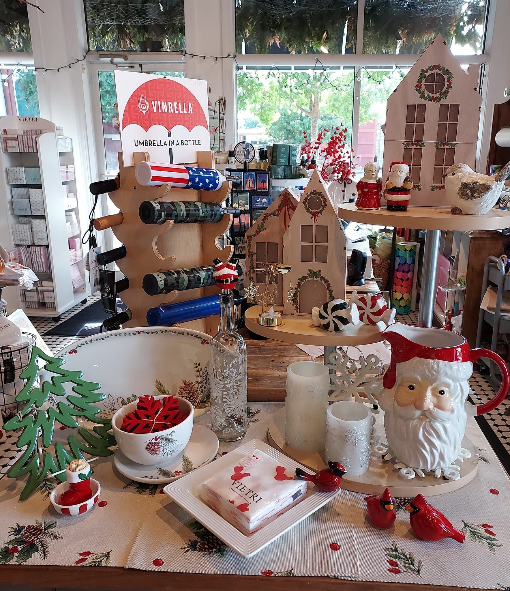 A table with a lot of christmas decorations on it
