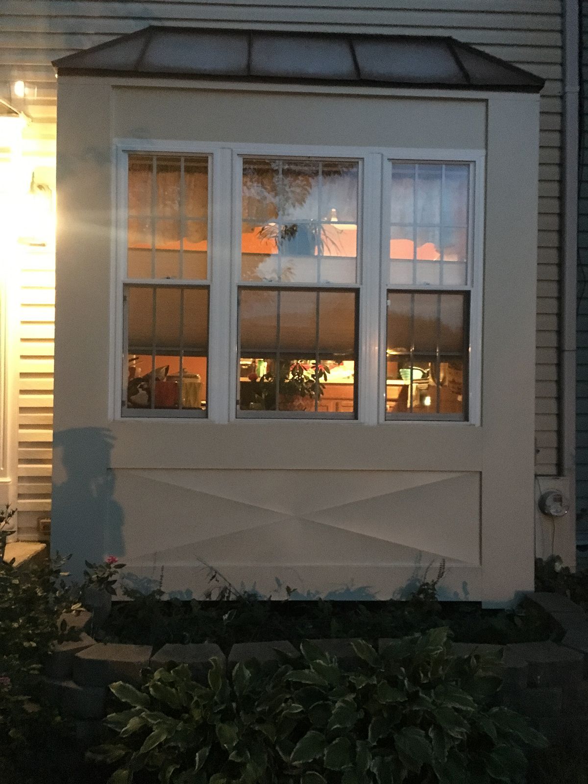 A large window on the side of a house