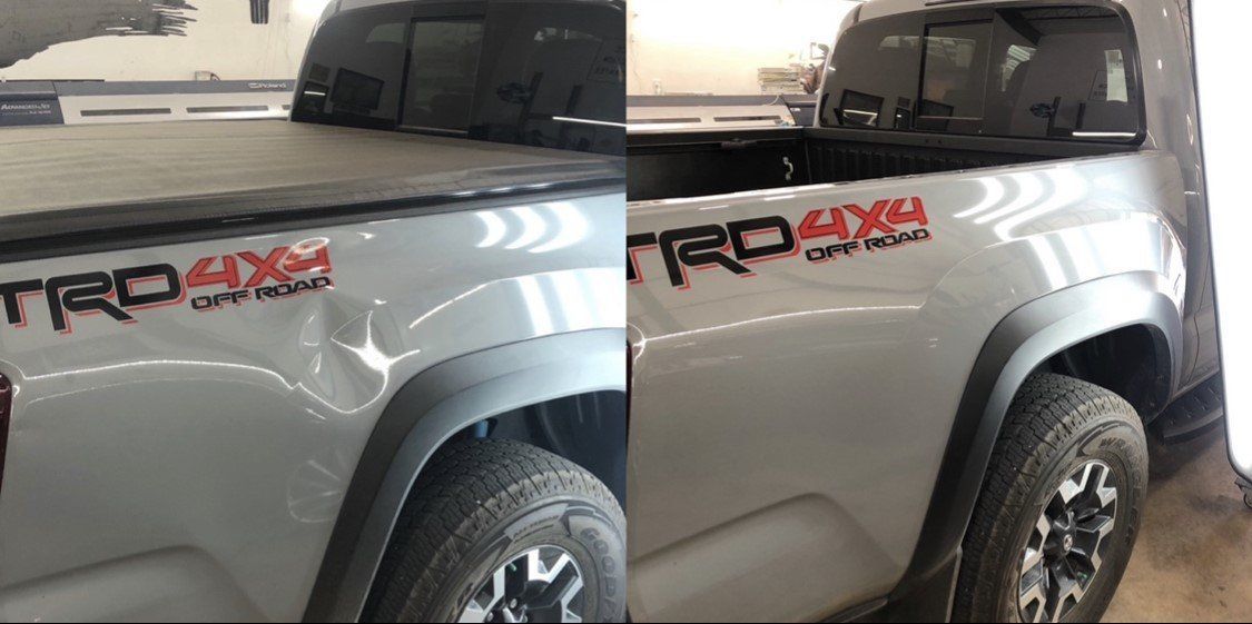 A white Toyota truck with TRD 4x4 Off Road badge, dented rear panel.