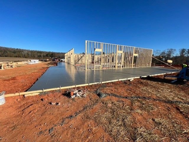 A building under construction with a concrete slab