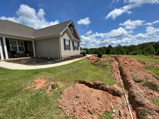 a house with a lot of dirt in front of it