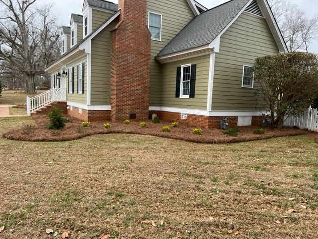 a large house with a large lawn in front of it
