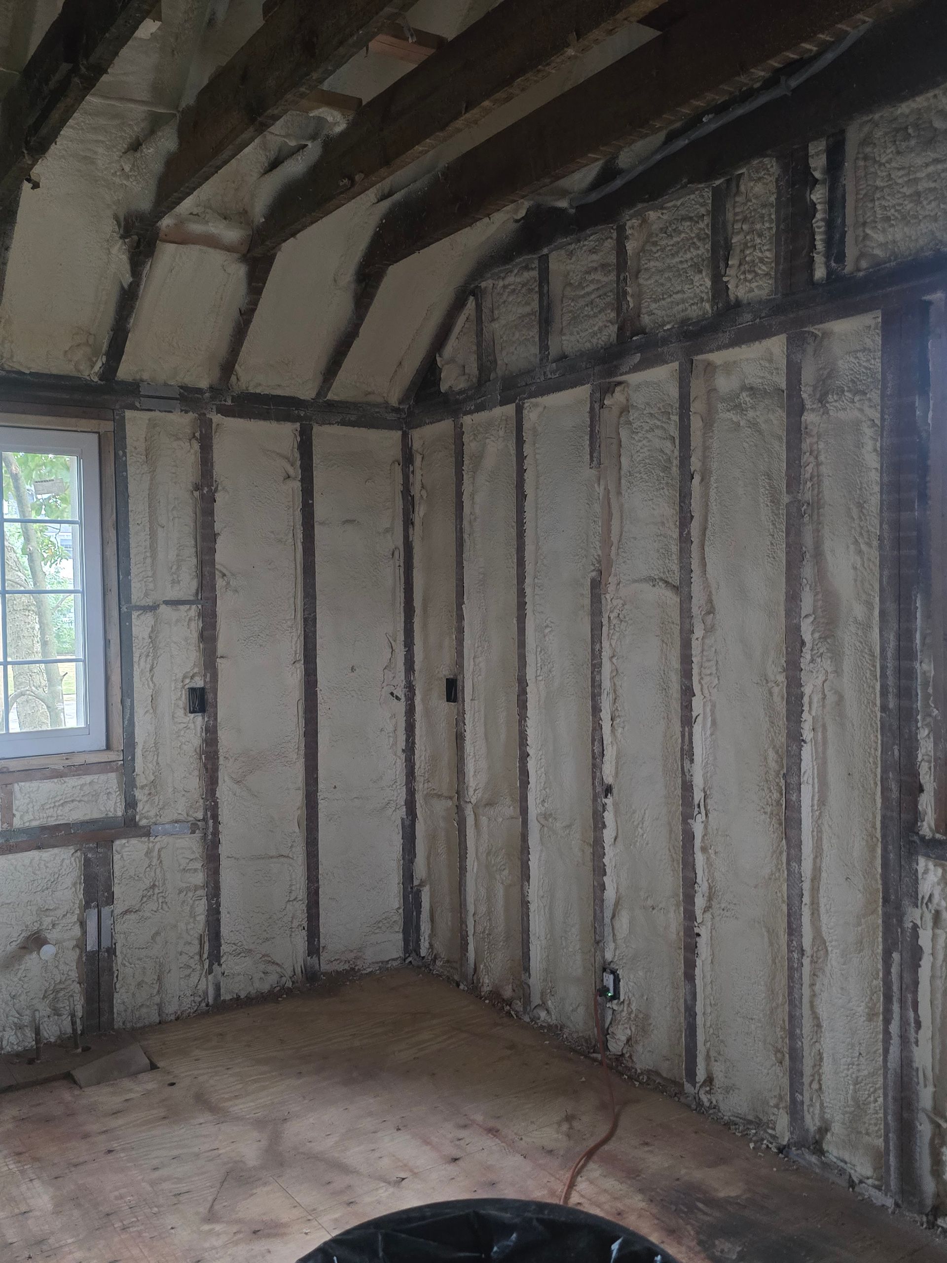 A room with a lot of insulation on the walls and ceiling.